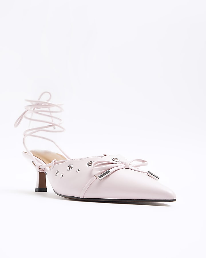 Pink eyelets lace up heeled court shoes