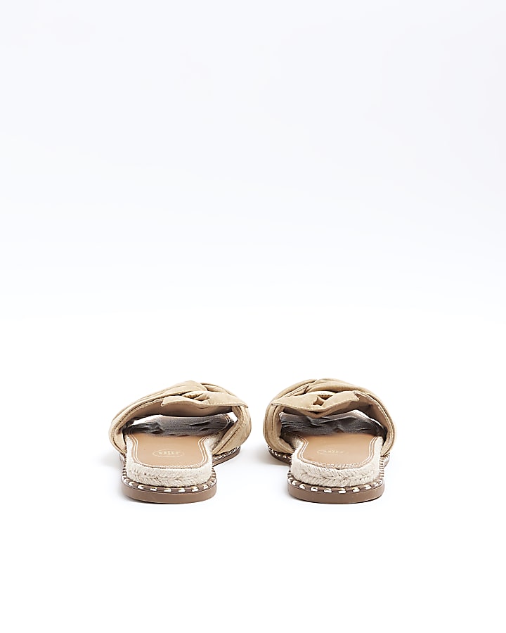 Beige twisted flat sandals