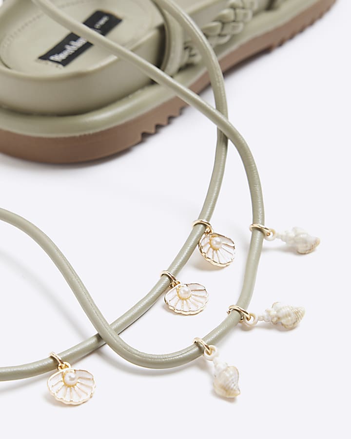 Green shell detail lace up sandals