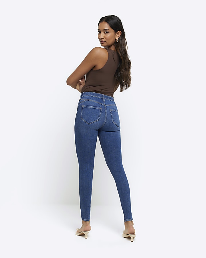 Blue mid rise bum sculpt skinny jeans