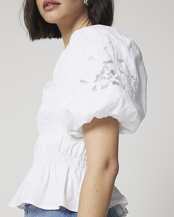 White shirred cut out puff sleeve blouse