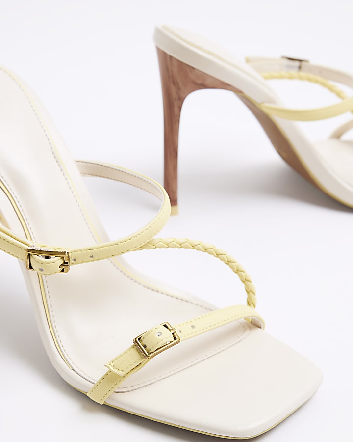 Yellow strappy heeled mule sandals