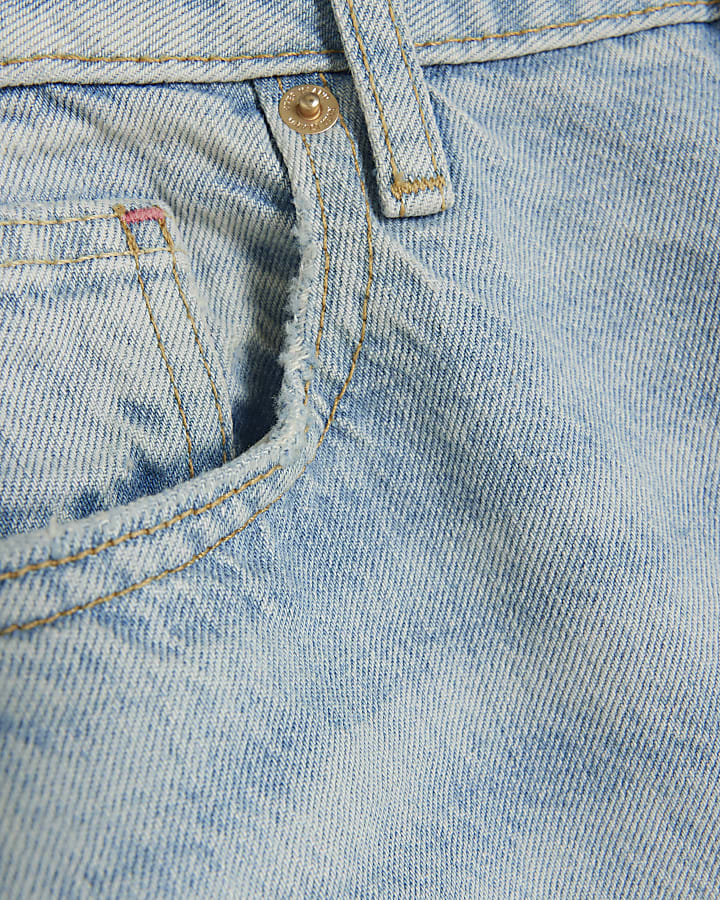 Petite blue ripped stove pipe straight jeans