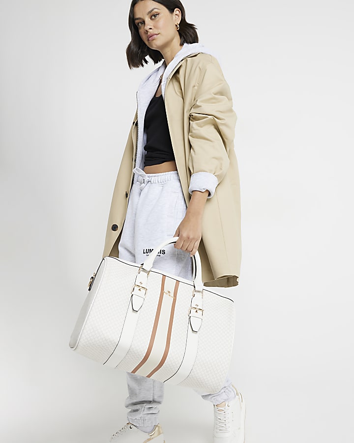 White monogram buckle strap travel bag River Island