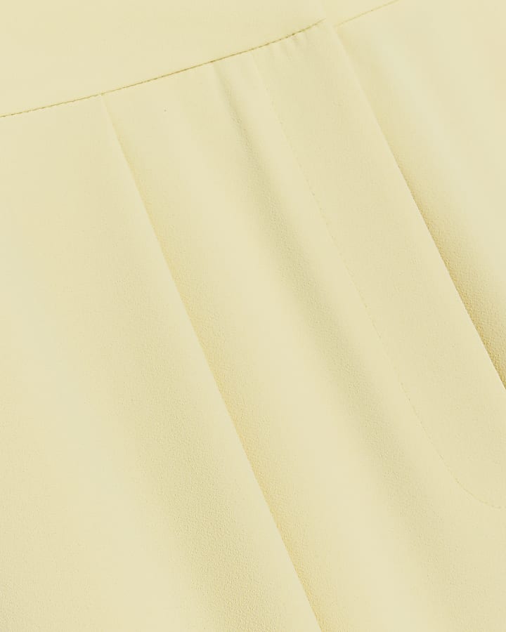 Yellow pleated wide leg trousers