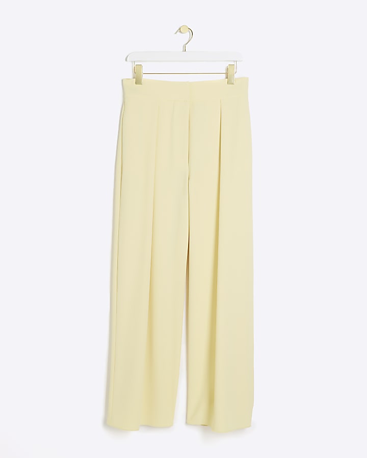 Yellow pleated wide leg trousers