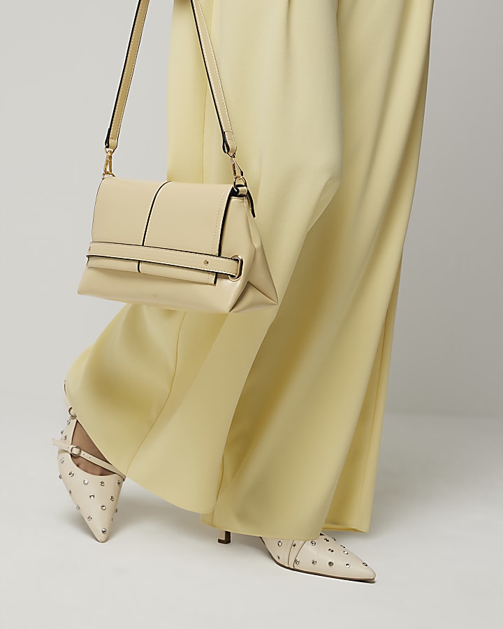 Yellow pleated wide leg trousers