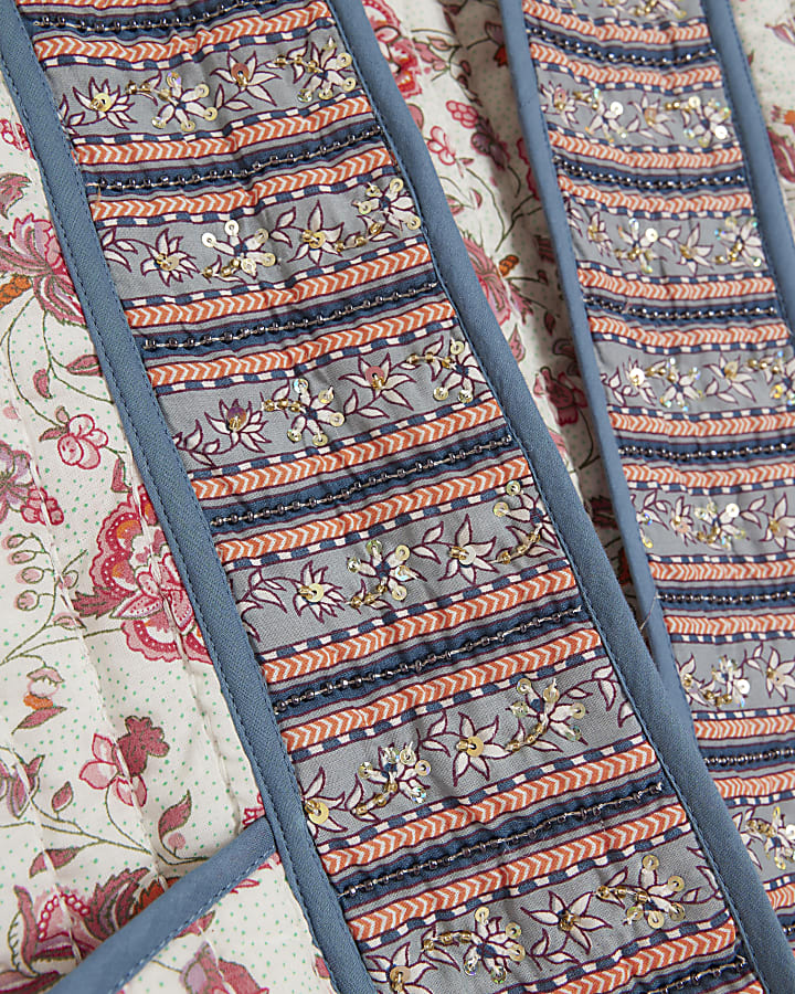 Pink quilted floral gilet