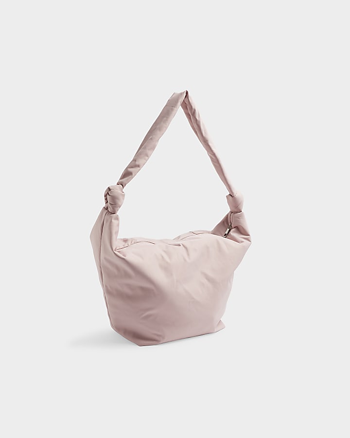 Pink knot scoop cross body bag