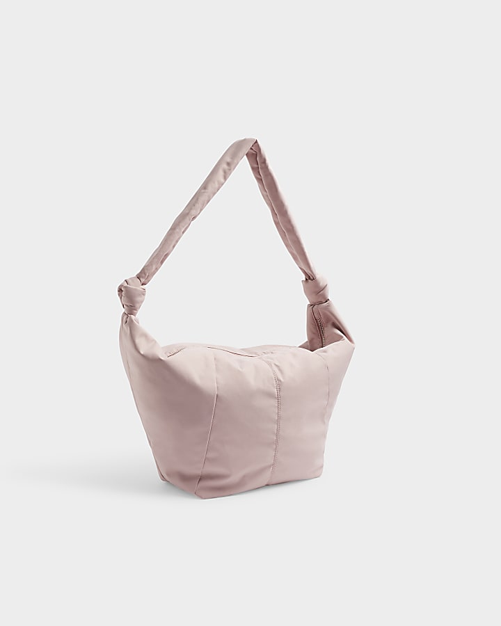 Pink knot scoop cross body bag