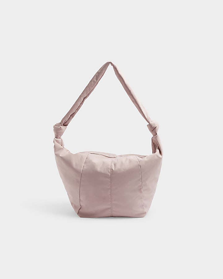 Pink knot scoop cross body bag