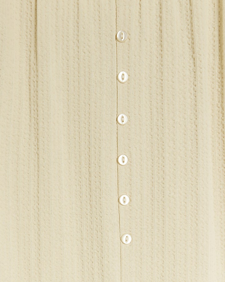 Cream textured button jumpsuit