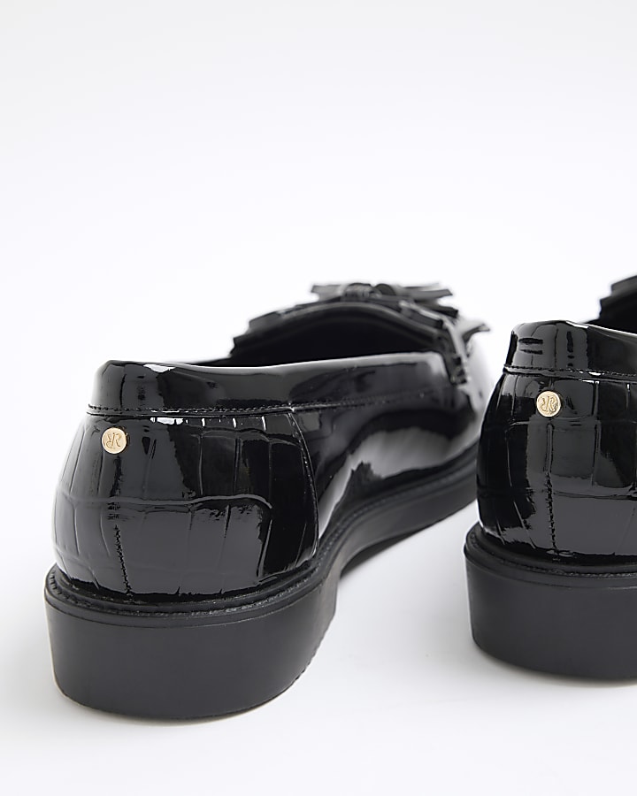 Black tassel patent loafers