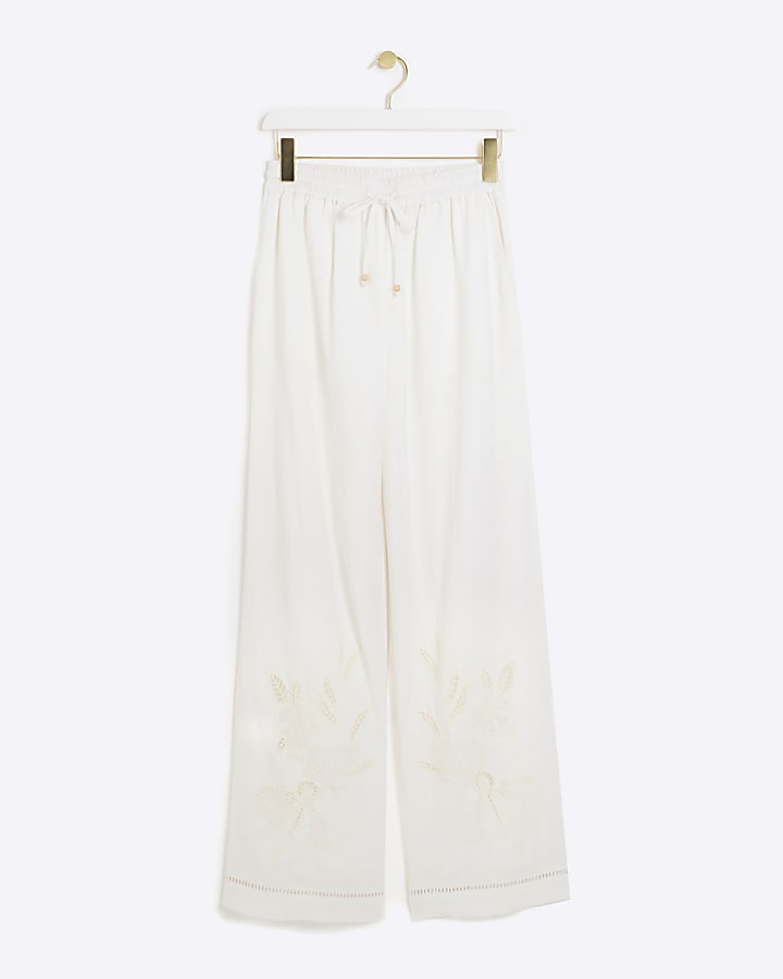 White broderie wide leg trousers