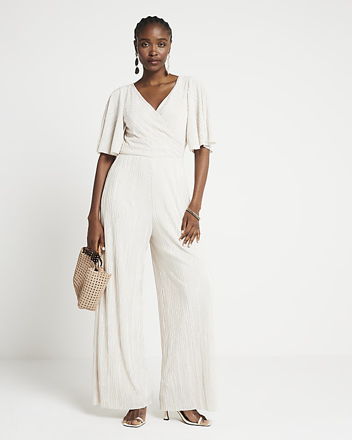 Cream plisse wide leg jumpsuit River Island