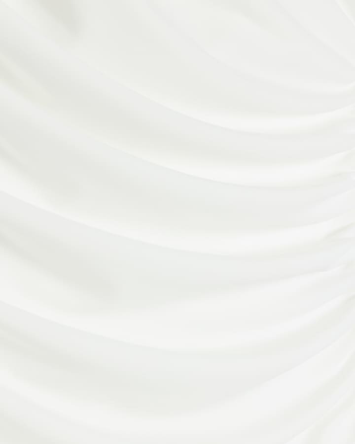 Cream drape asymmetric top