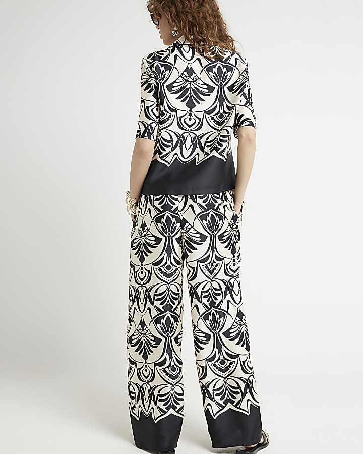 Black geometric wide leg trousers