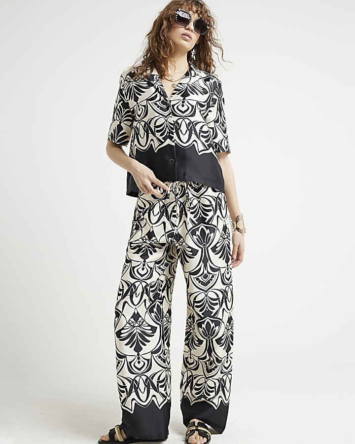 Black geometric wide leg trousers