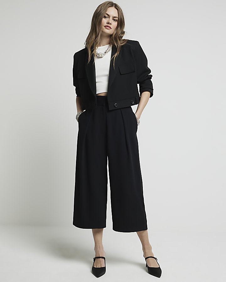 Black wide leg pleated cropped trousers River Island