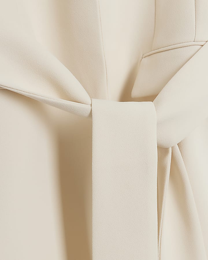 Cream belted longline wrap blazer