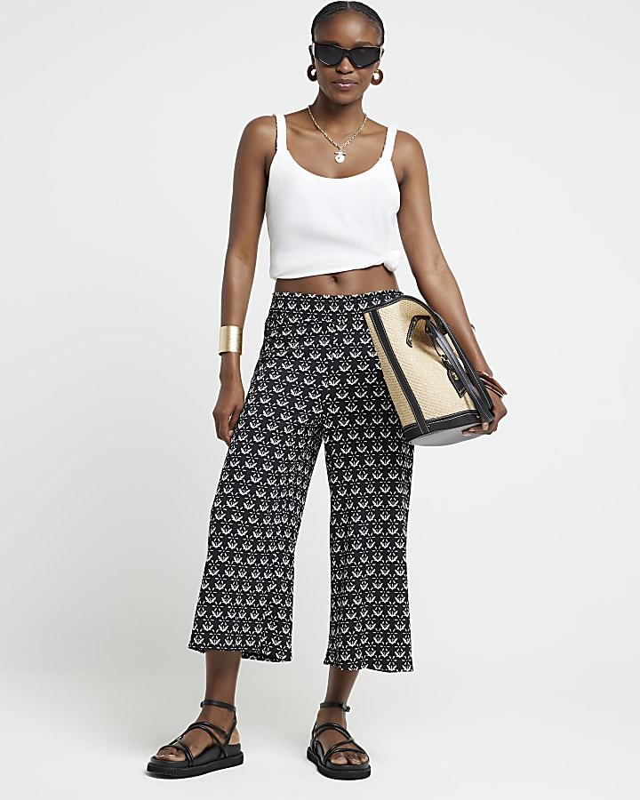 Cropped black wide leg trousers hotsell