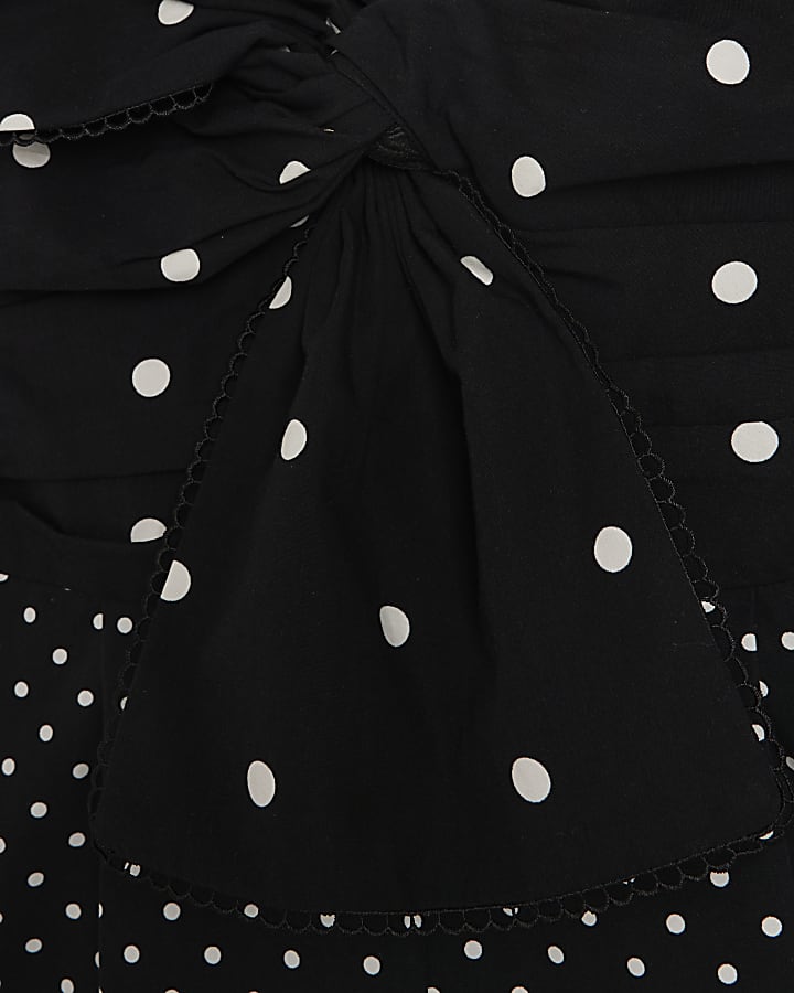 Black spot bow sleeveless playsuit