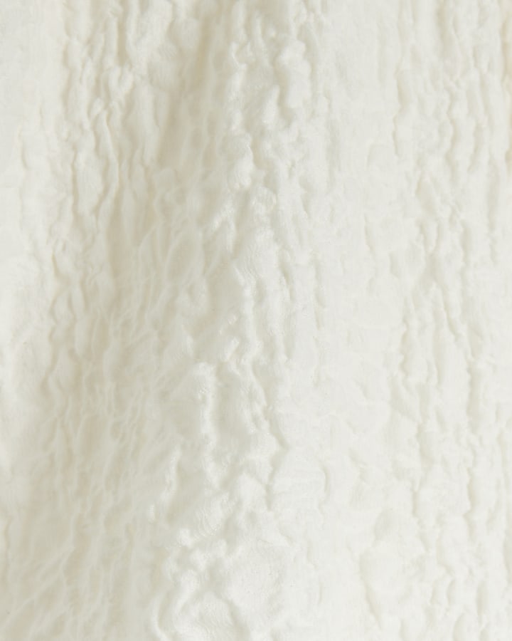 Cream pull on textured shorts