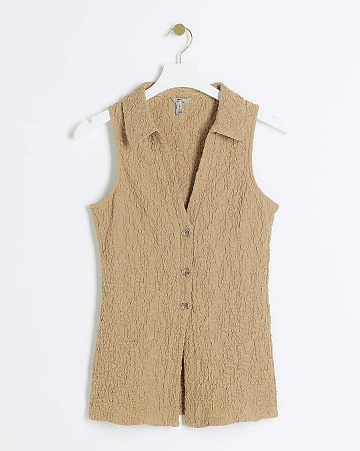 Beige textured sleeveless shirt