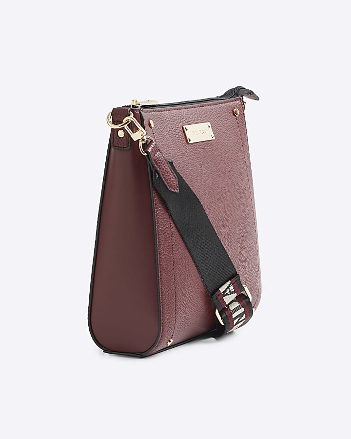 Red textured messenger cross body bag