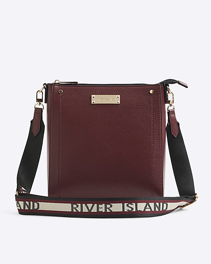 Red textured messenger cross body bag