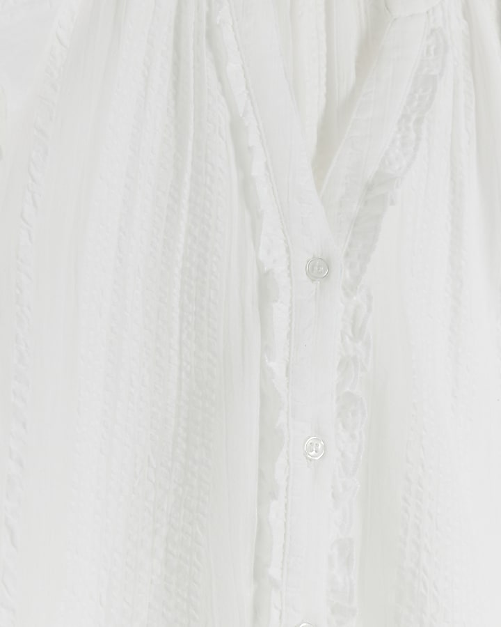 White frill V-neck blouse