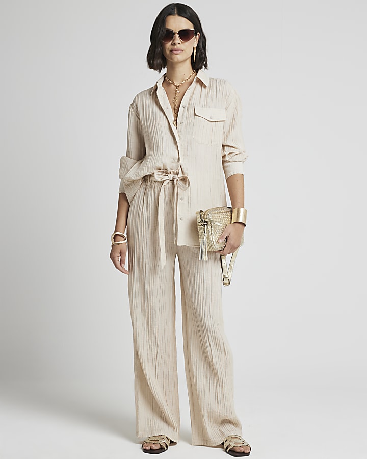 Beige textured wide leg trousers