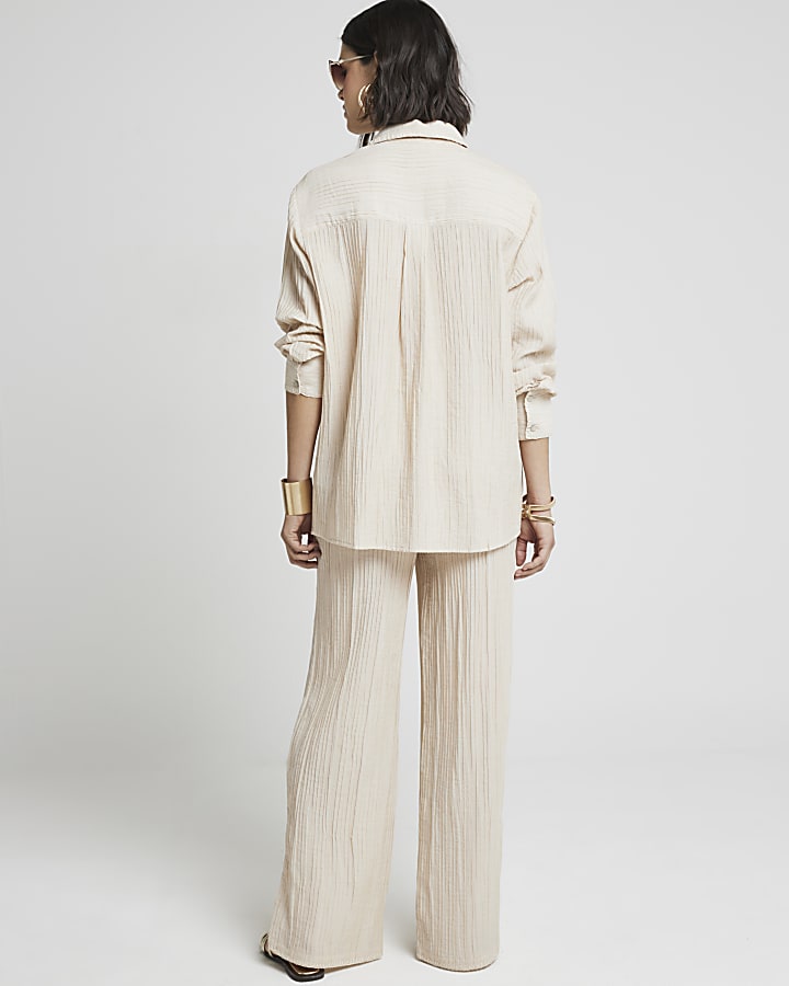 Beige textured wide leg trousers