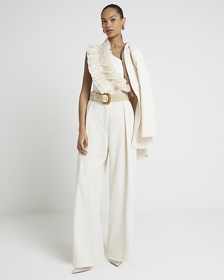 Cream pleated wide leg trousers