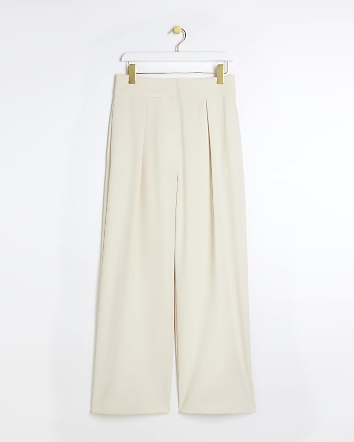 Cream pleated wide leg trousers