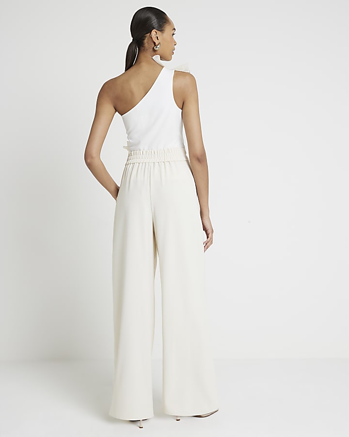 Cream pleated wide leg trousers