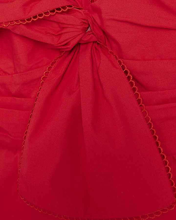 Red bow sleeveless playsuit