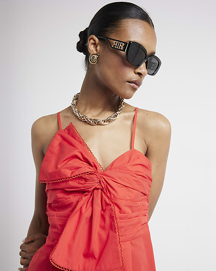 Red bow sleeveless playsuit