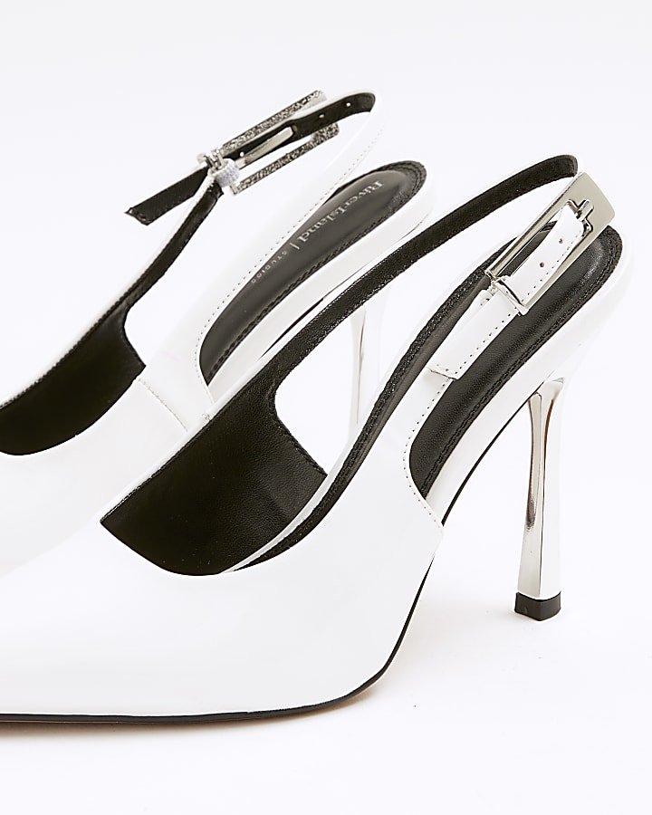 White sling back heeled court shoes