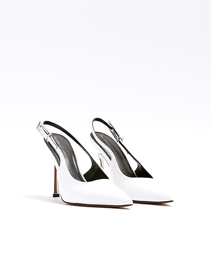 White sling back heeled court shoes