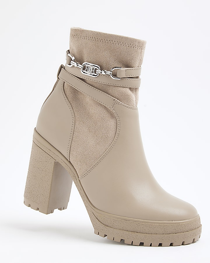 Beige hardware strap heeled boots