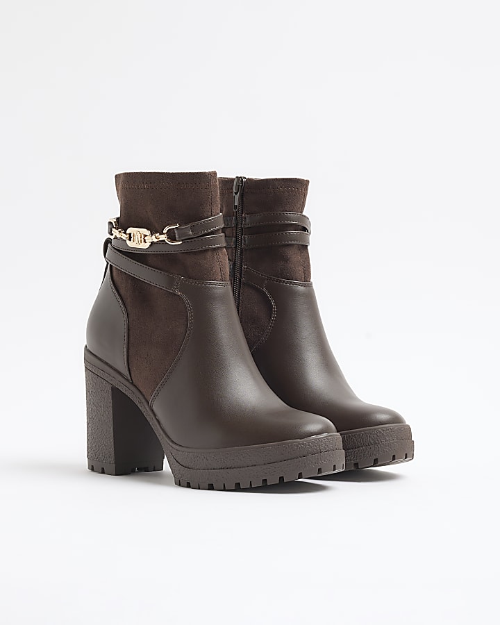 Brown hardware strap heeled boots