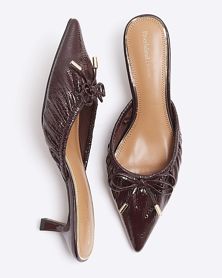 Red patent ruched bow heeled court shoes