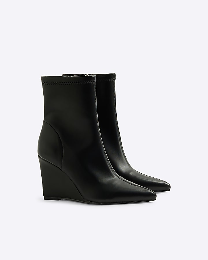 Black wedge heeled ankle boots