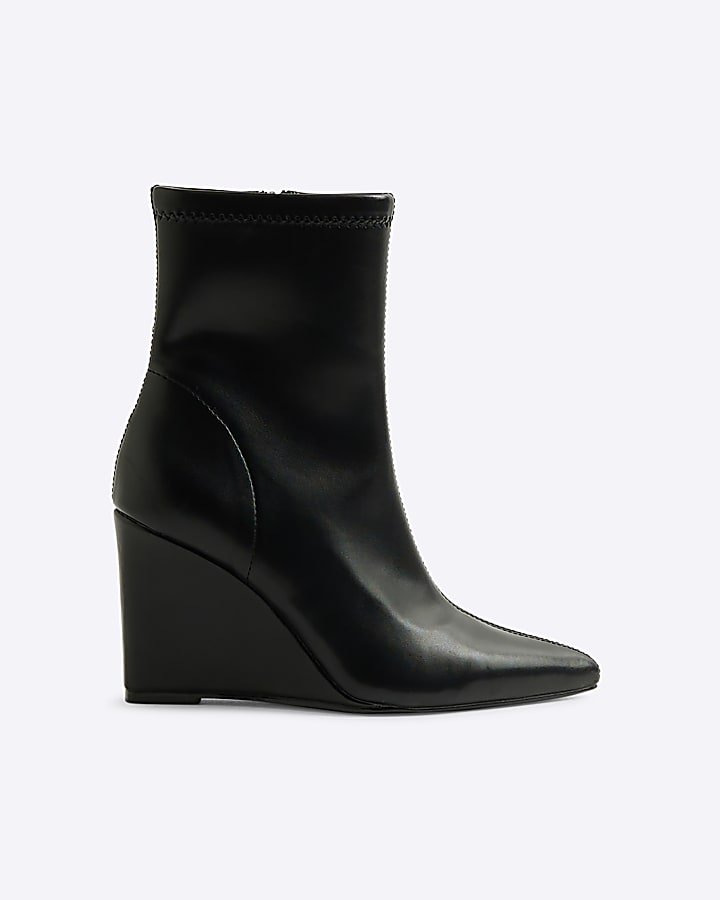 Black wedge heeled ankle boots