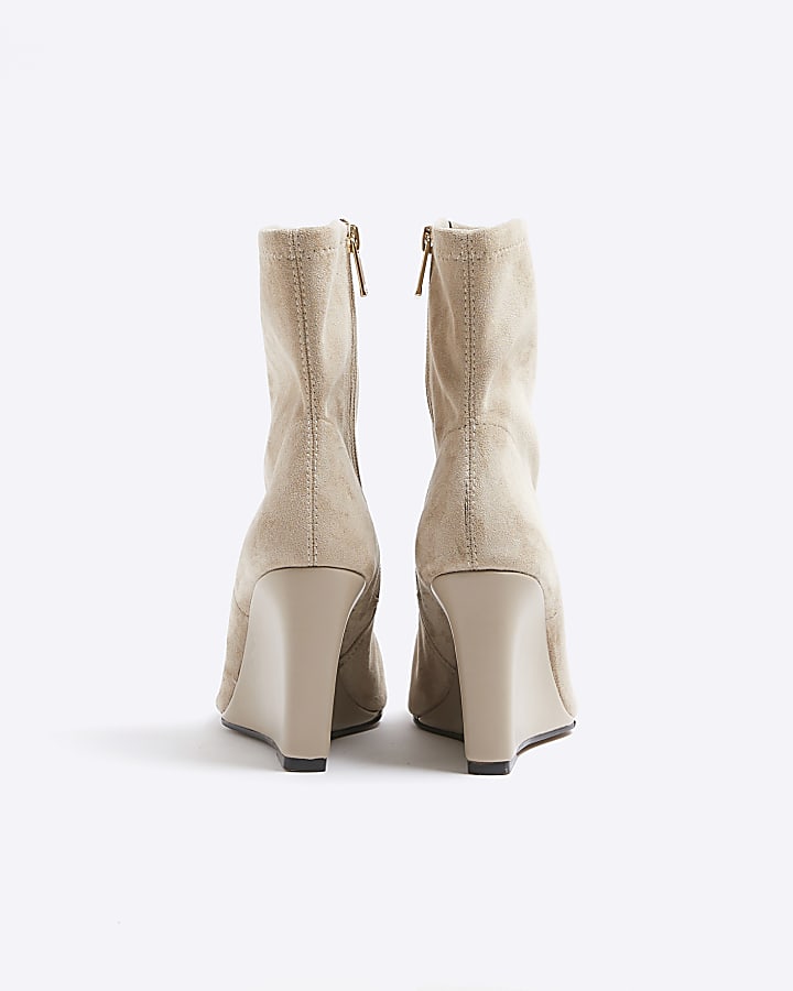 Beige suedette wedge heeled ankle boots