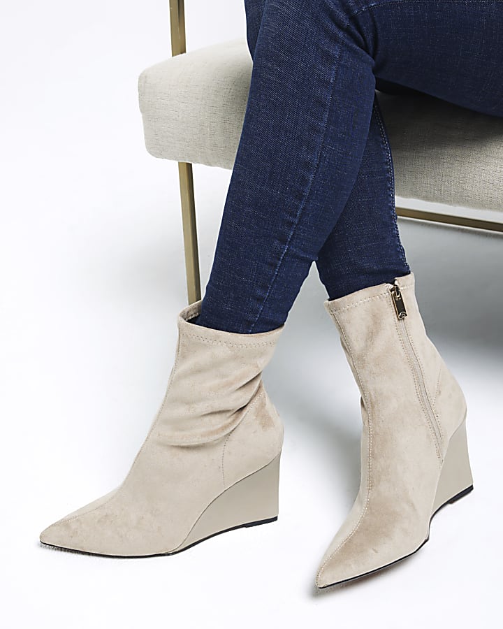 Beige suedette wedge heeled ankle boots