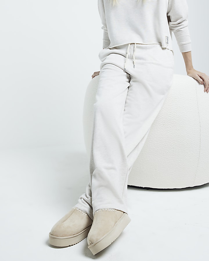Beige faux suede faux fur platform mules
