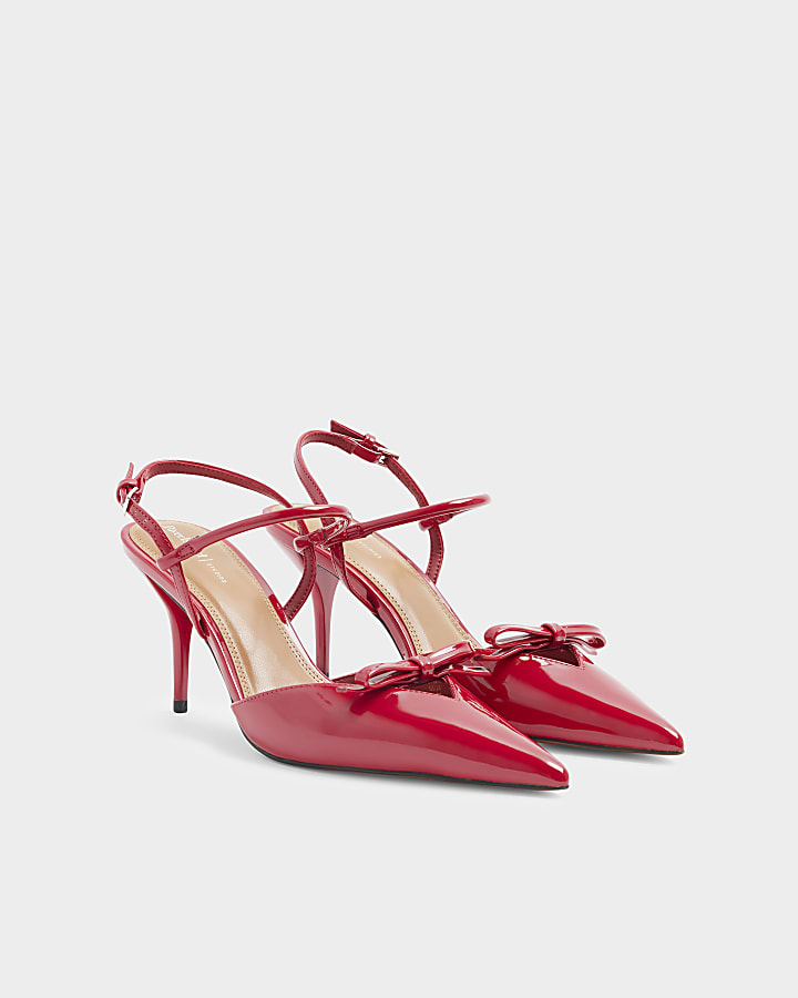Red patent bow sling back heeled court shoes