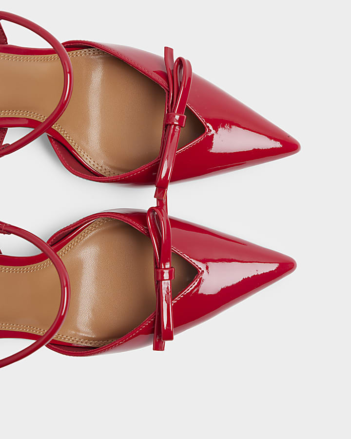 Red patent bow sling back heeled court shoes